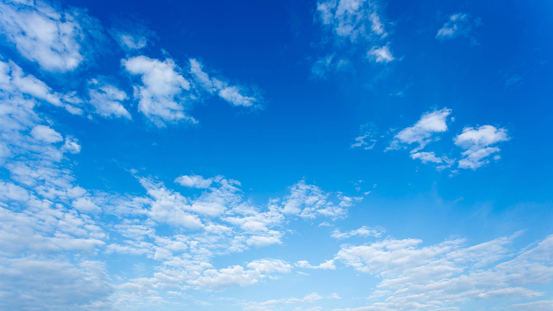 Birght blue sky with white clouds